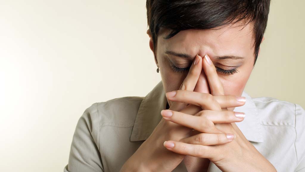 Pain Relief Medication Addiction - Safe Laser Therapy LLC - Call (203) 601-7772 woman with hands on her face showing depression nd stress